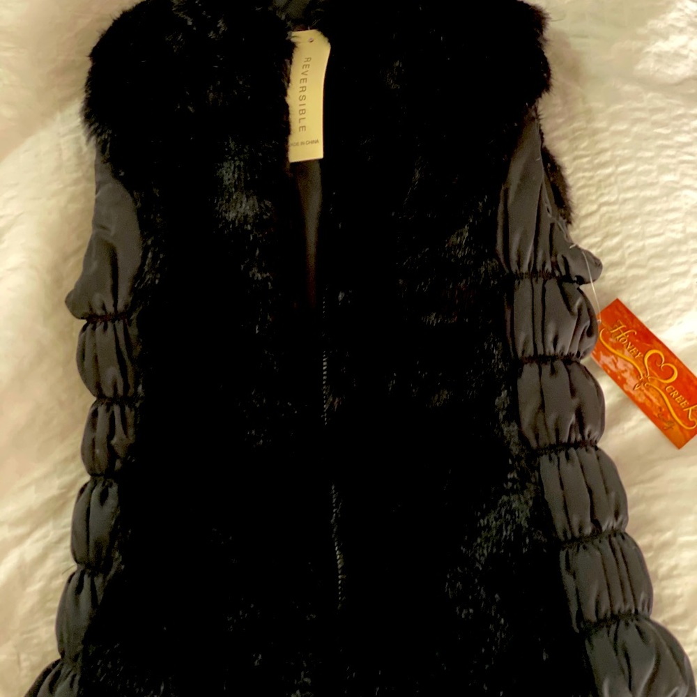 Scully reversible faux fur puffer vest. Pockets.